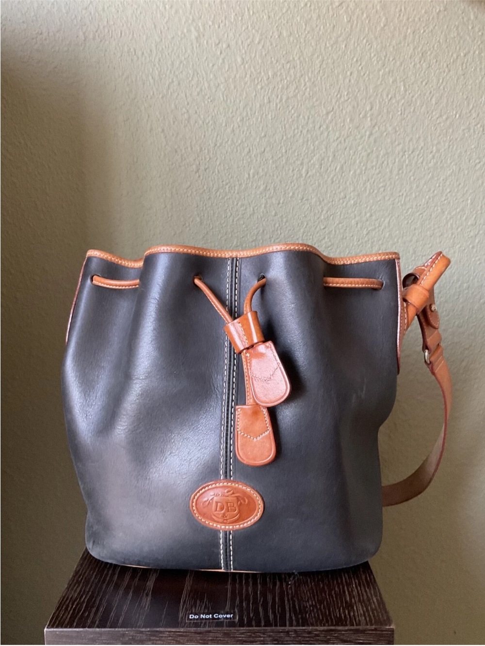 Dooney & Bourke Brown Leather Drawstring Bucket Bag with Tan Trim